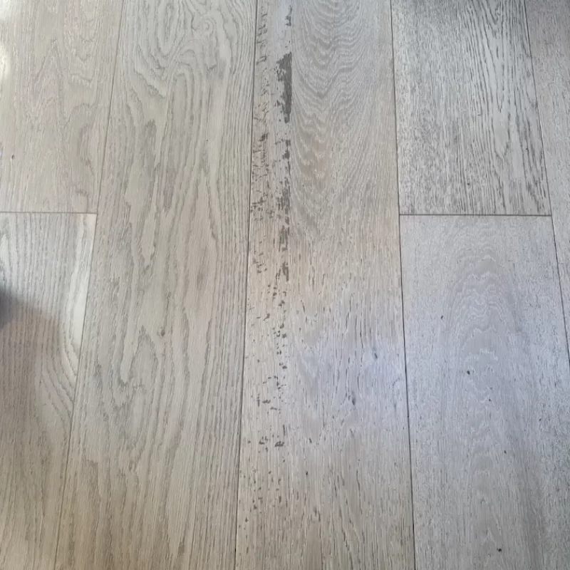 timber floor that has damaged marks